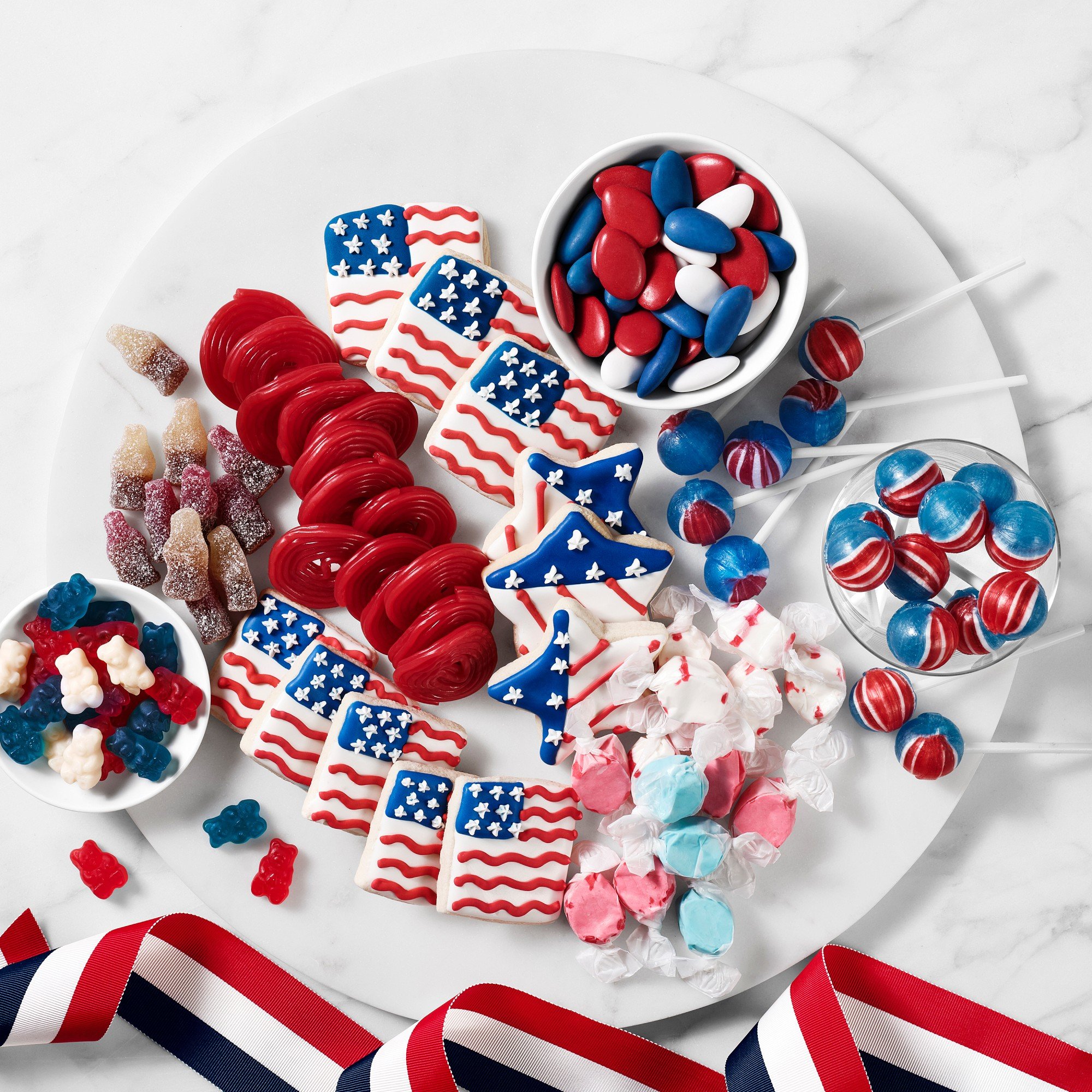 american flag candy and treats on a white plate
