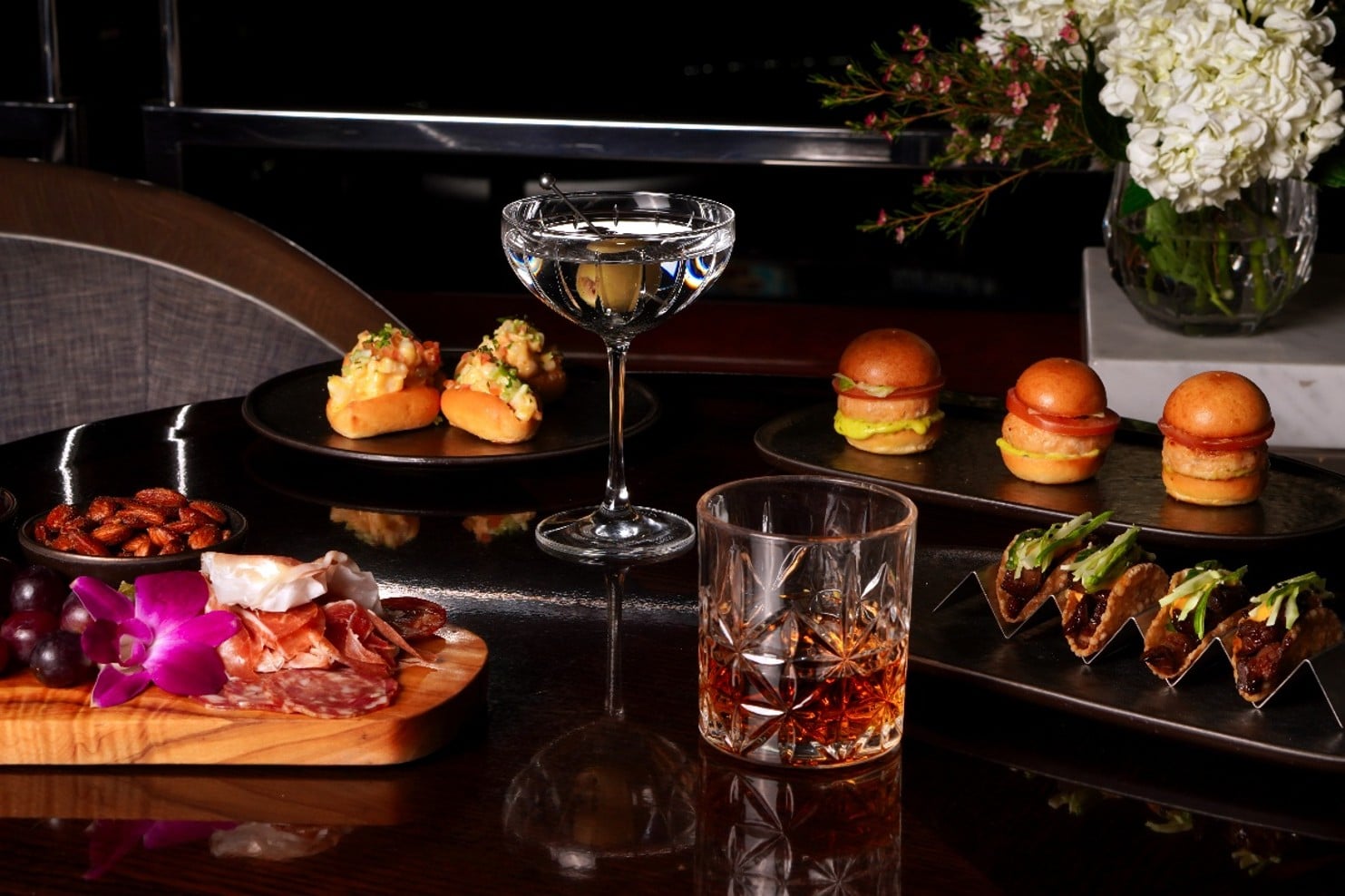 Burger sliders, tacos, lobster rolls, and charcuterie